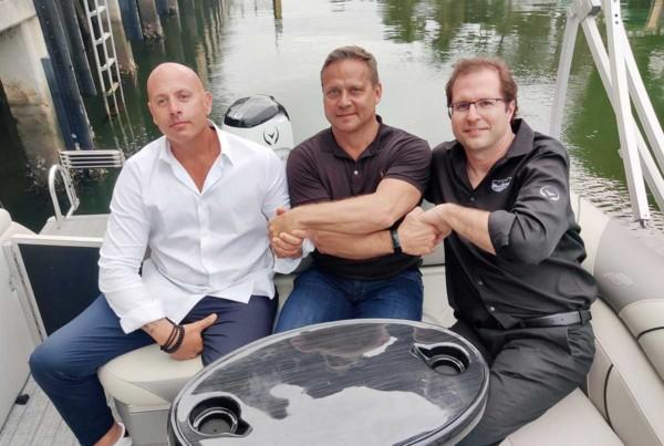 Alexandre Mongeon, Xavier Montagne, Vision Marine Technologies. Niklas Öhman in the middle.